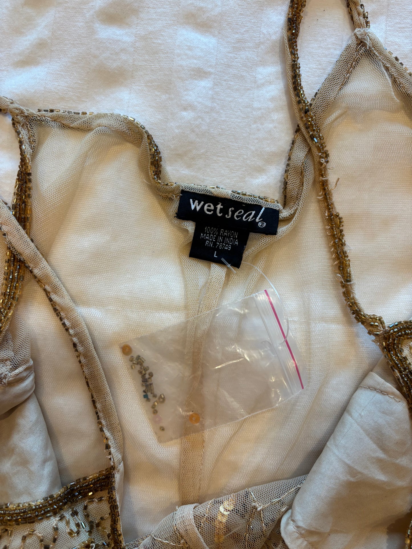 beaded wet seal top