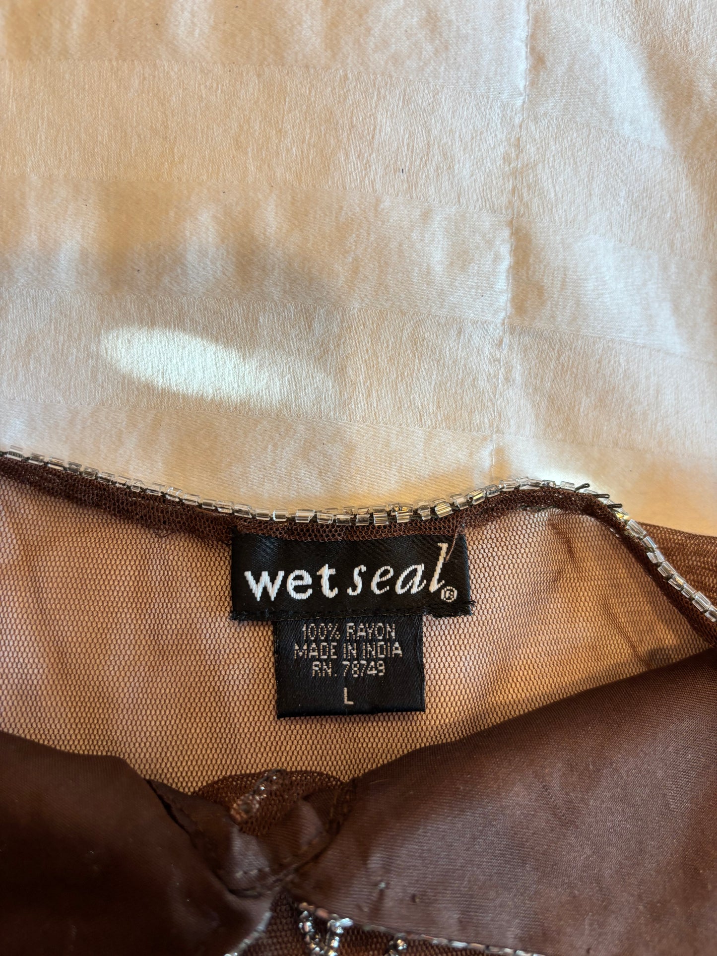 beaded wet seal top